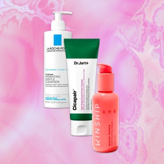 Best Facial Cleansers: a collaged image of La Roche-Posay Toleriane Hydrating Gentle Cleanser, Dr. Jart+ Cicapair Tiger Grass Enzyme Foam Cleanser, and Kinship Naked Papaya Gentle Enzyme Face Cleanser on a marbled pink and purple background